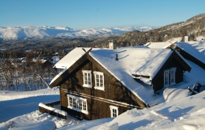 Hytte i snødekt vinterlandskap ( Novasol) 
